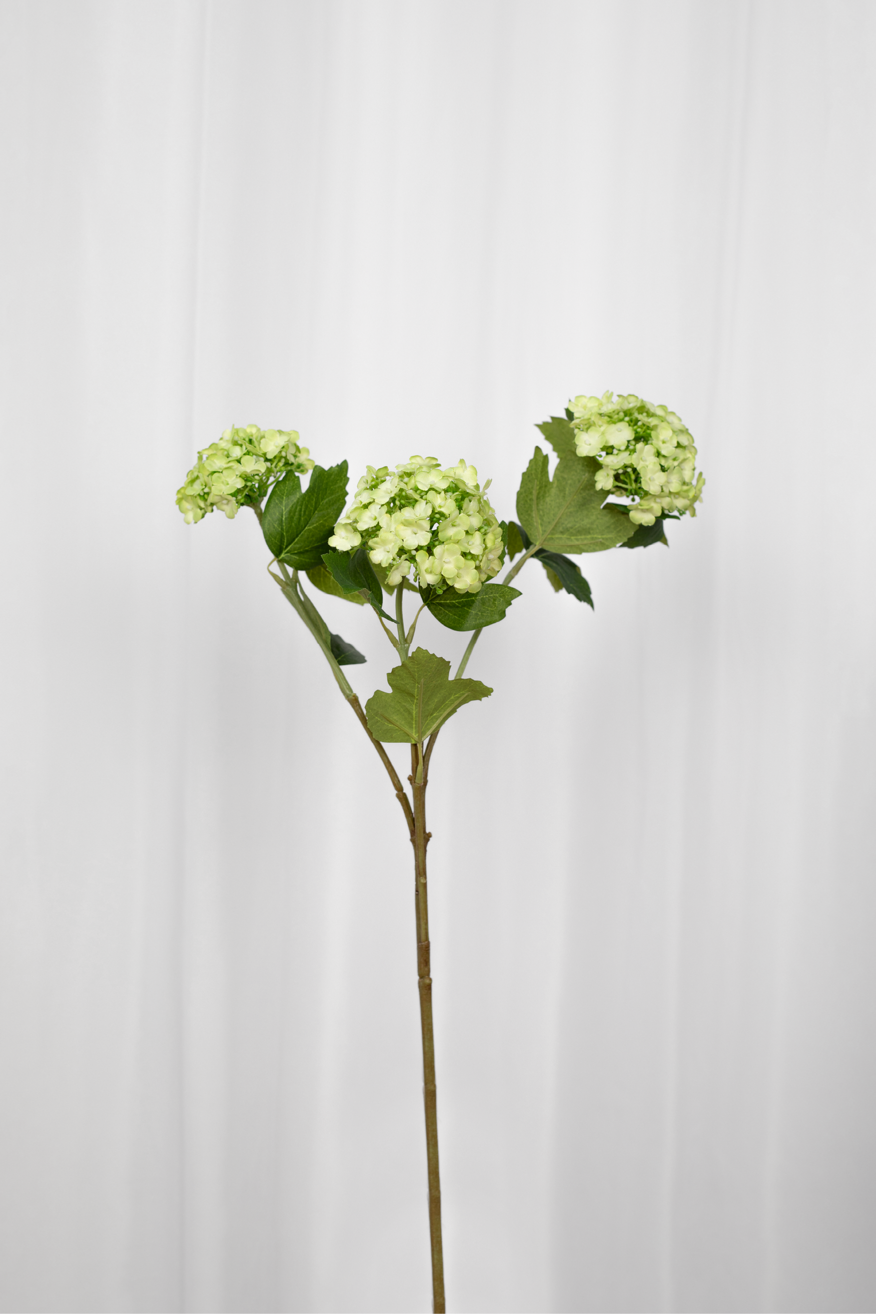 Kunstig lysegrøn hortensia gren med 3 hoveder.