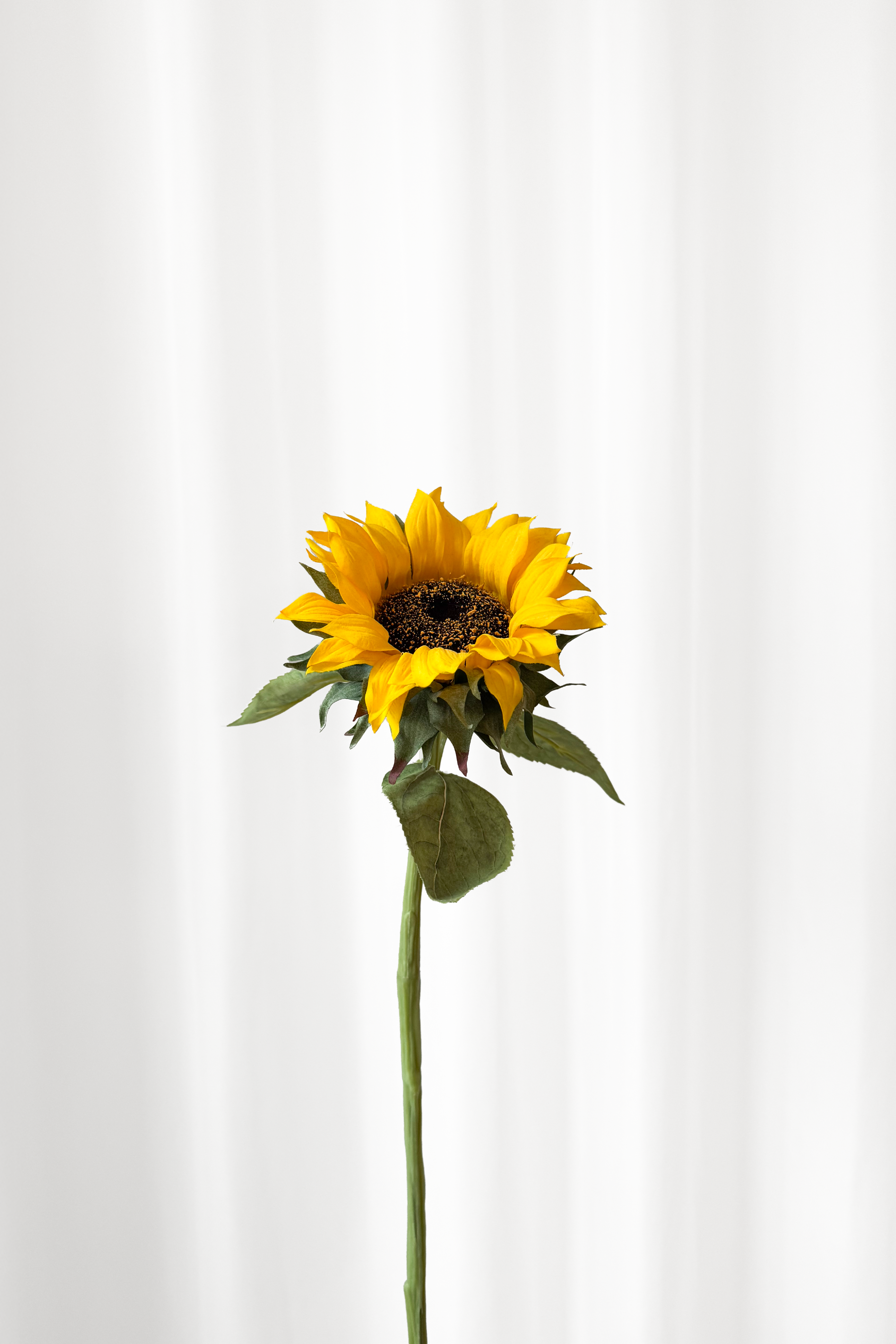 Kunstig solsikke fra Specktrum med naturtro detaljer.