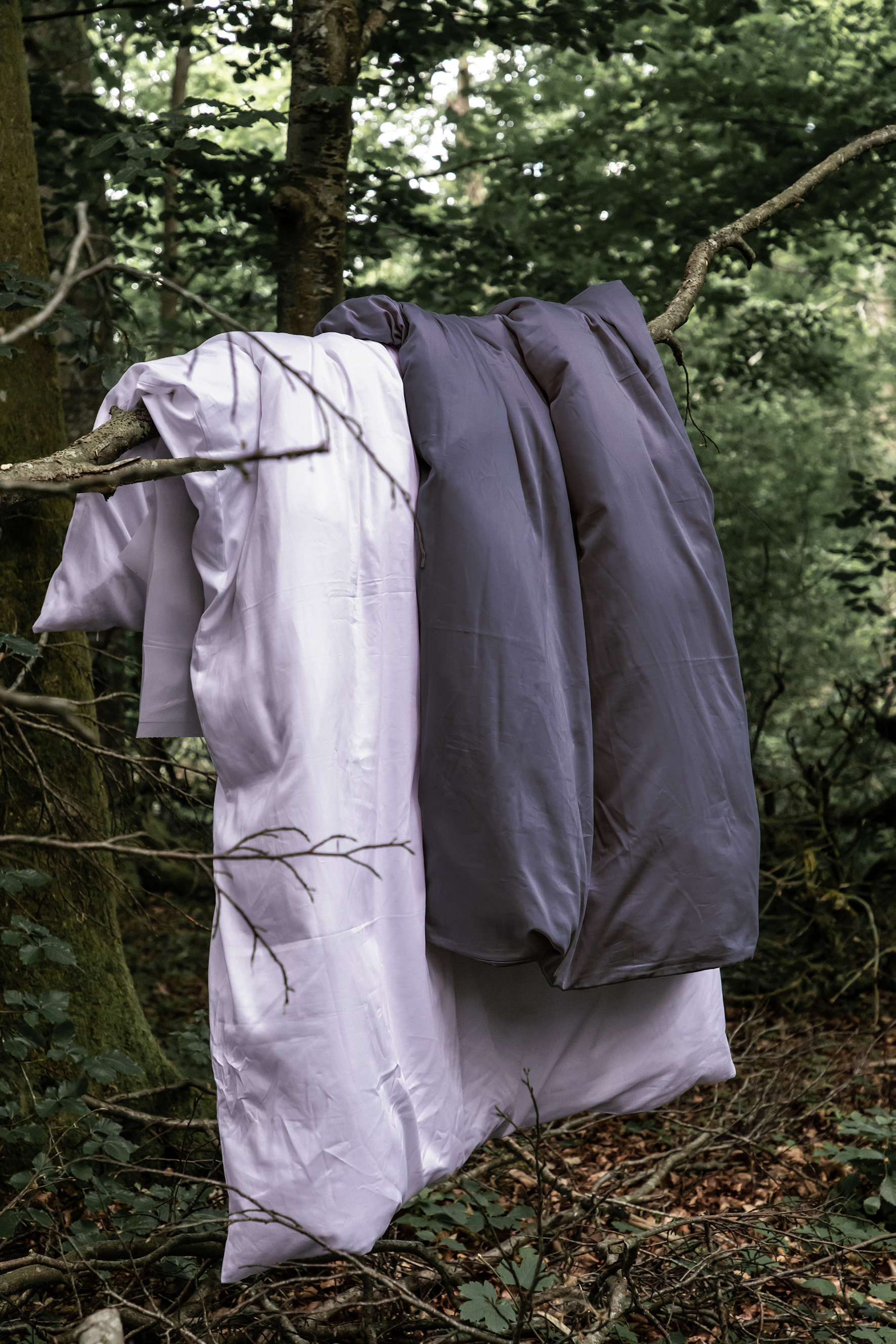 Sengetøj i naturen. økologisk bomuldssatin sengesæt fra Specktrum.