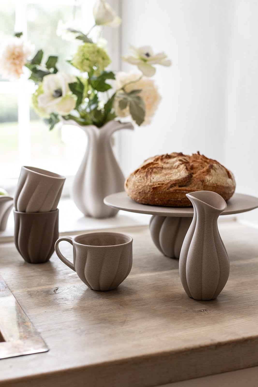 Nellie Kop - Med hank | Sand