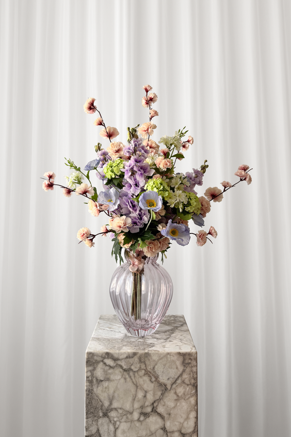 Luftig og sommerlig buket i pastelfarver i naturtro kunstige blomster fra Specktrum.