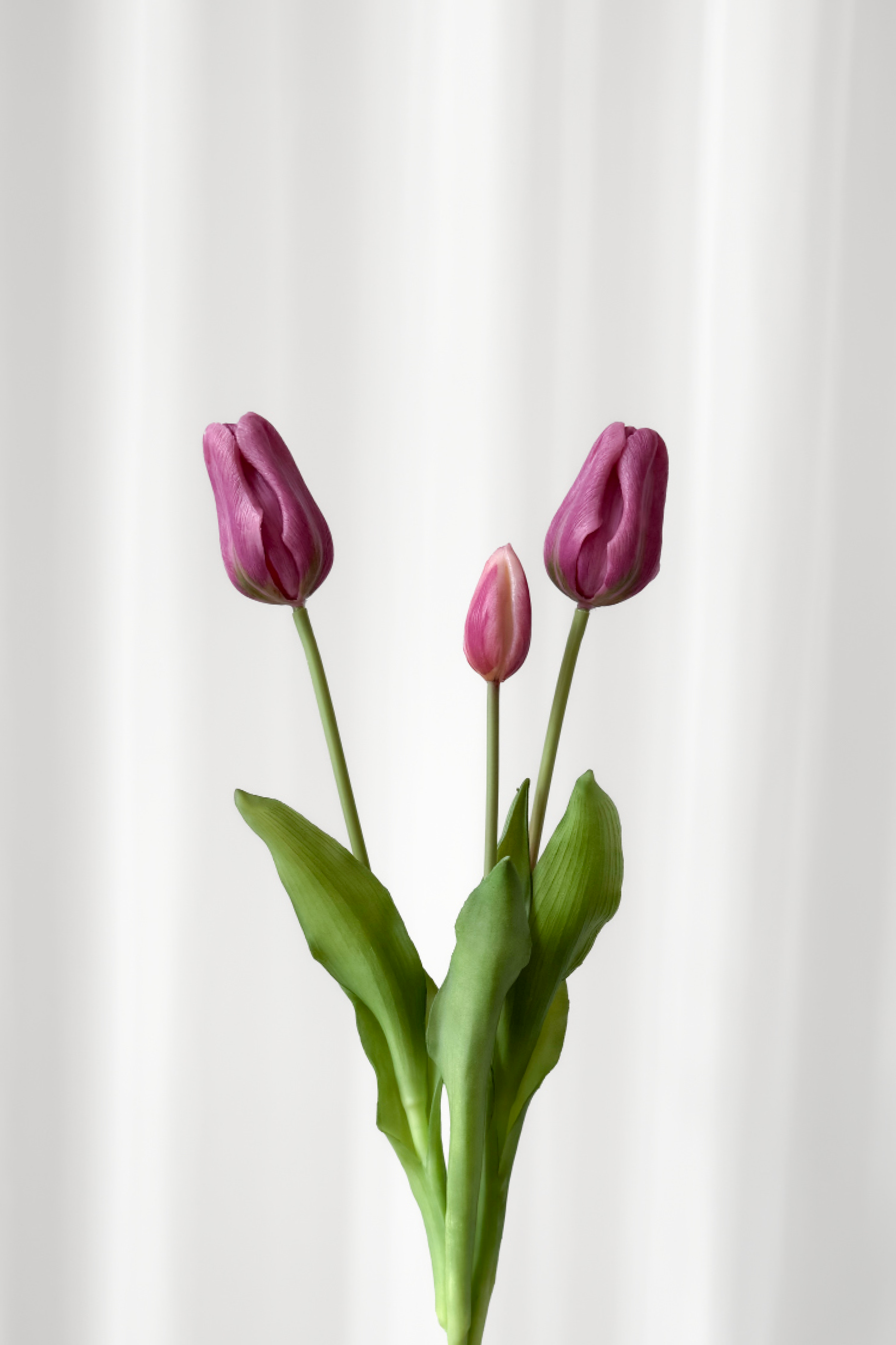 Bundt af lyselilla tulipaner fra Specktrum. Tulipanerne er naturtro dog kunstige. 