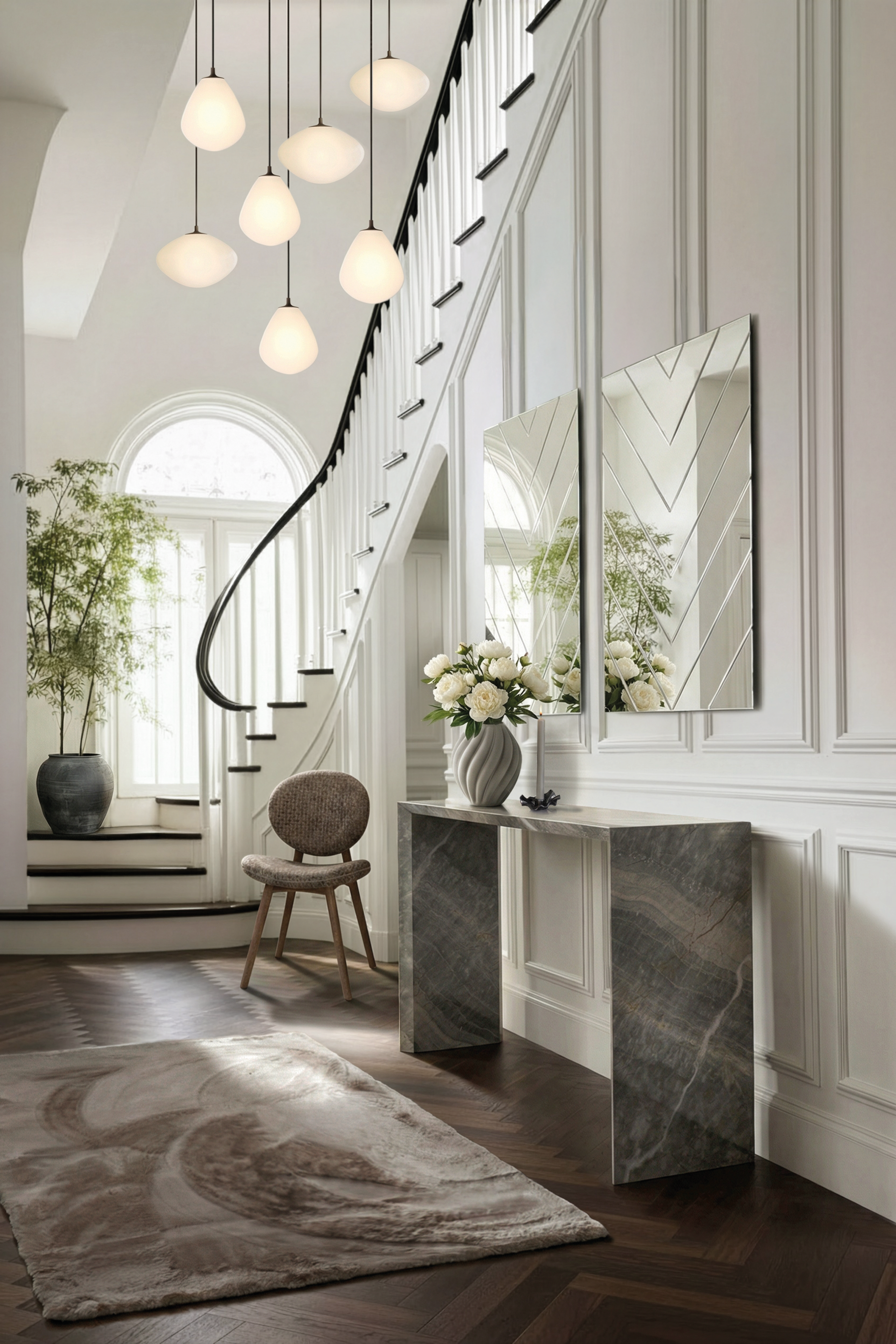 Eleanor pendler lamper i en herskabelig entre stylet med andre Specktrum designs. 