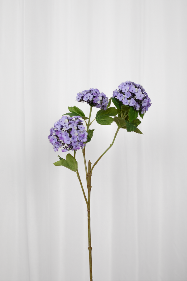 Kunstig hortensia gren i lilla med tre hoveder.