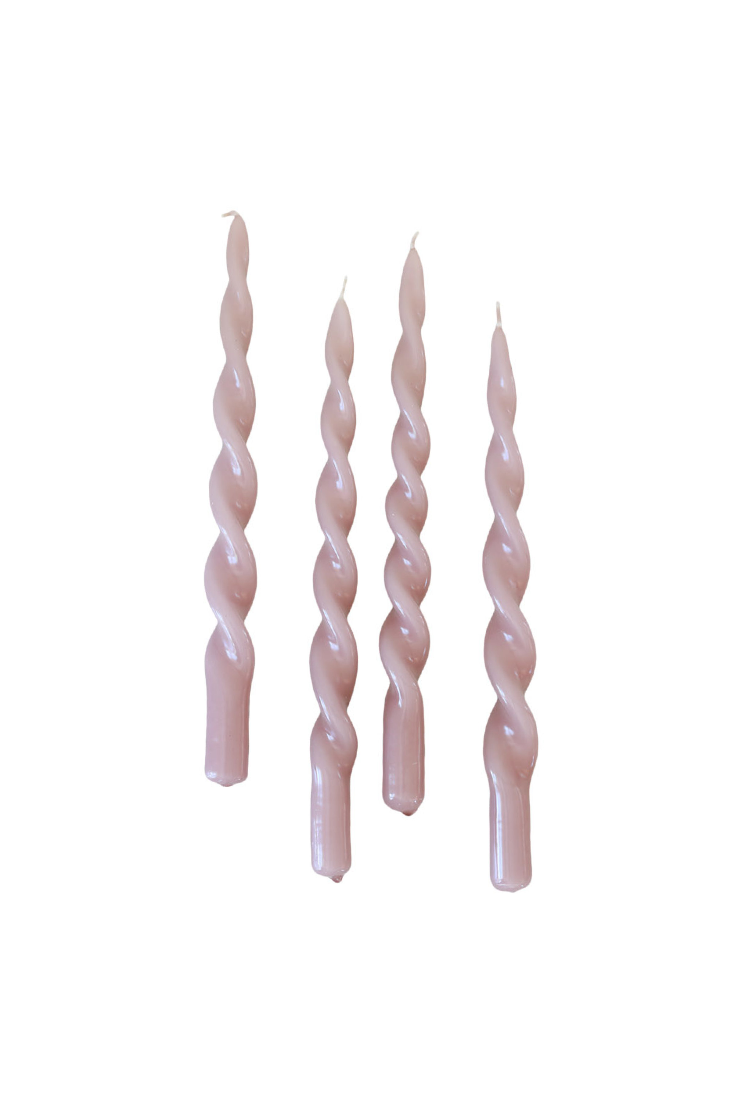 Fire snoede lys i støvet rosa farve med blank overflade.