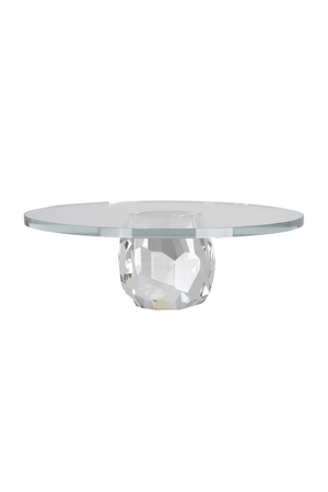 Kagefad i massivt krystalglas med en rund, klar glasplade, der bæres af en facetteret krystalfod i midten.