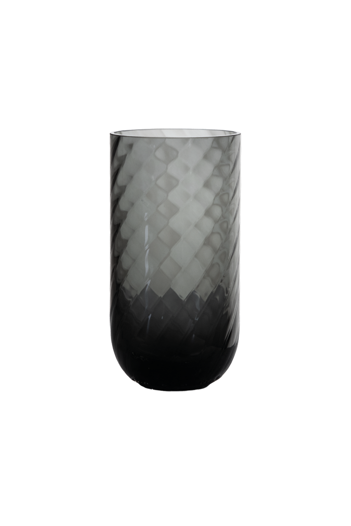 Cylindrisk glasvase i gråtonet glas med mønstret struktur og blank overflade.