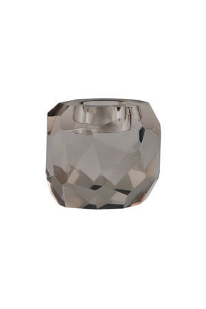 Lysestage i facetslebet krystalglas i røgfarvet grå nuance med rund form og plads til ét lys øverst.