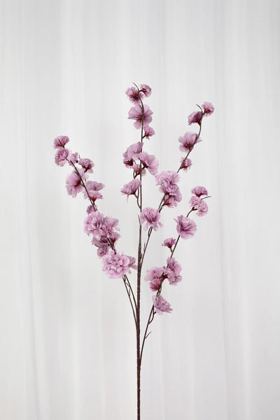 Kunstig lilla kirsebærgren.